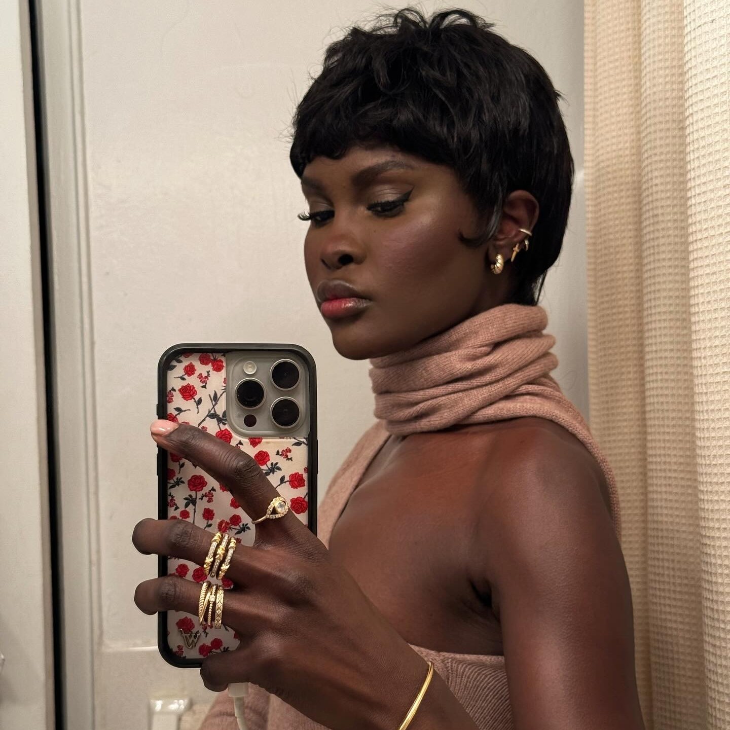 Photo of Amy Julliette Lefévre taking a mirror selfie 