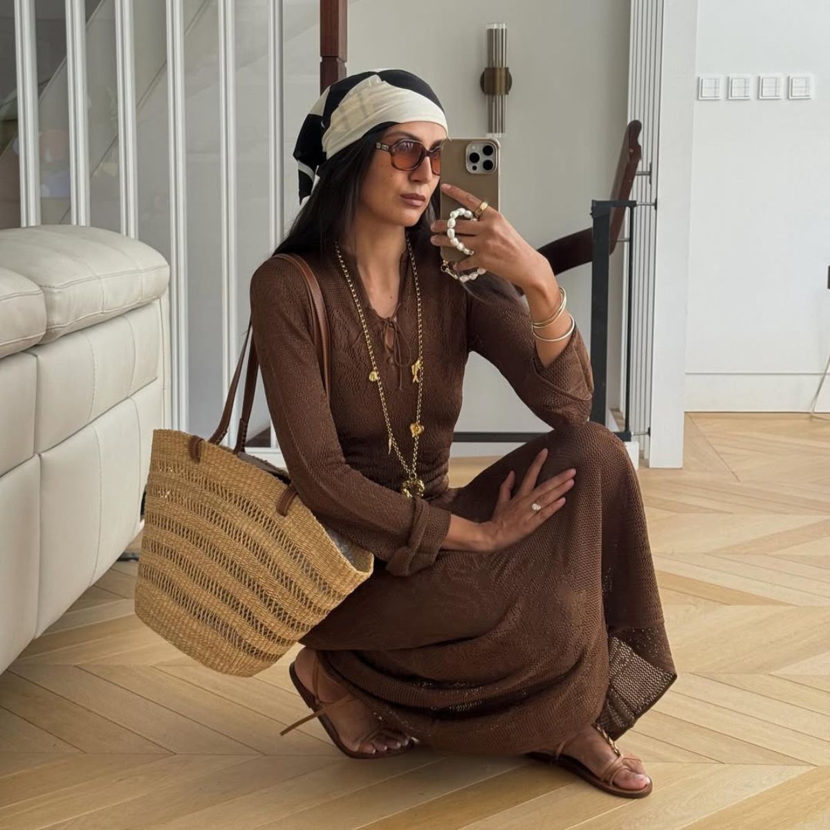 tijan serena poses with a straw basket bag