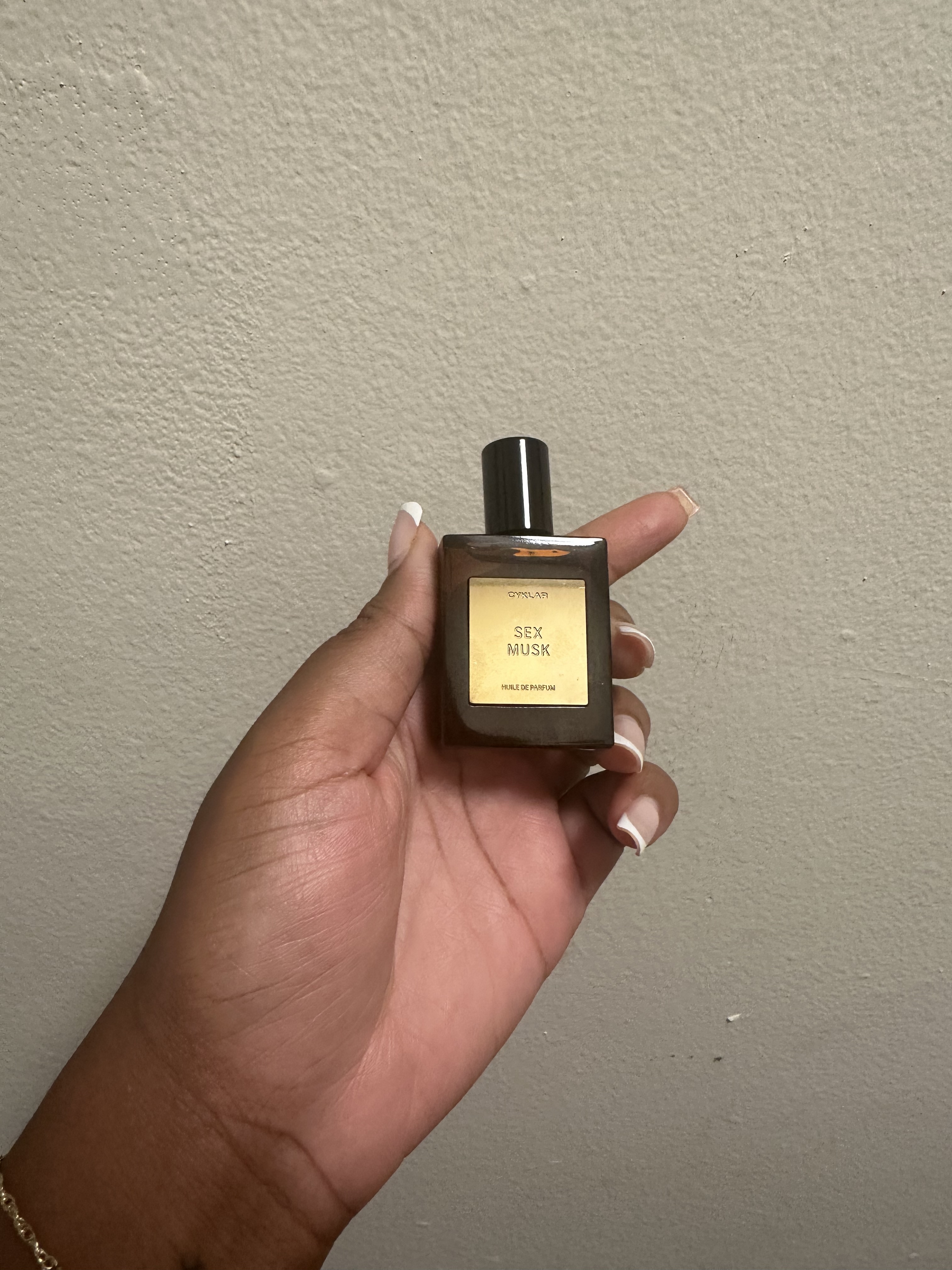 Ariel Baker testing Cyklar perfume oil