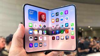 Apple iPhone Duo shown in hand