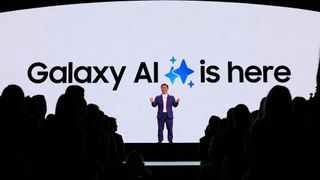 TM Roh of Samsung speaks at a Galaxy Unpacked event in front of Galaxy AI banner