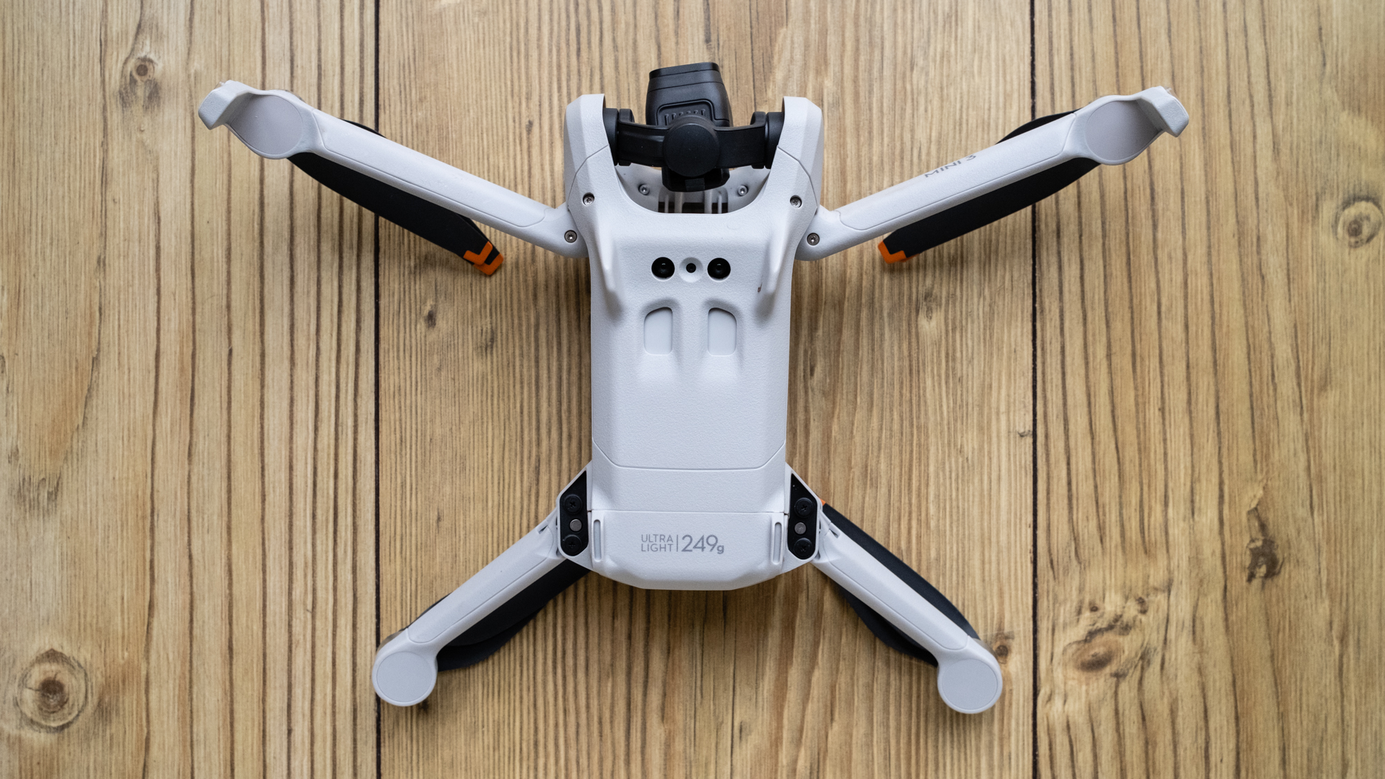 DJI Mini 3 upside-down showing under collision sensors