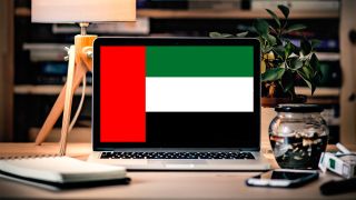 The UAE flag displayed on a laptop screen