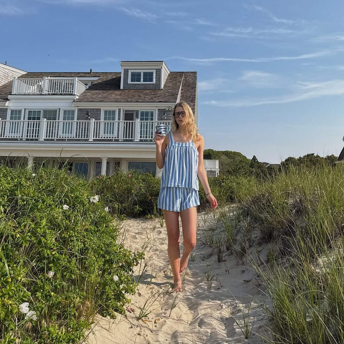 Lauren in a striped matching shorts set on the beach
