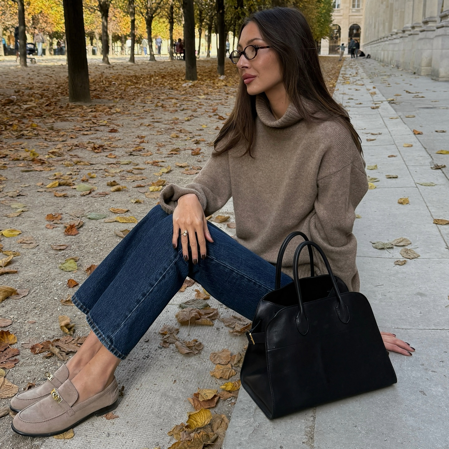 Felicia Akerstrom in taupe Hermes loafers