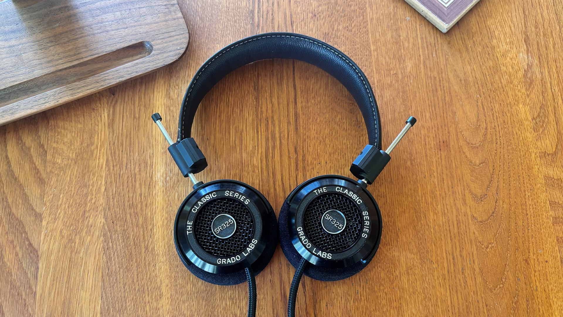 Grado SR325 Classic over-ear headphones on wooden surface