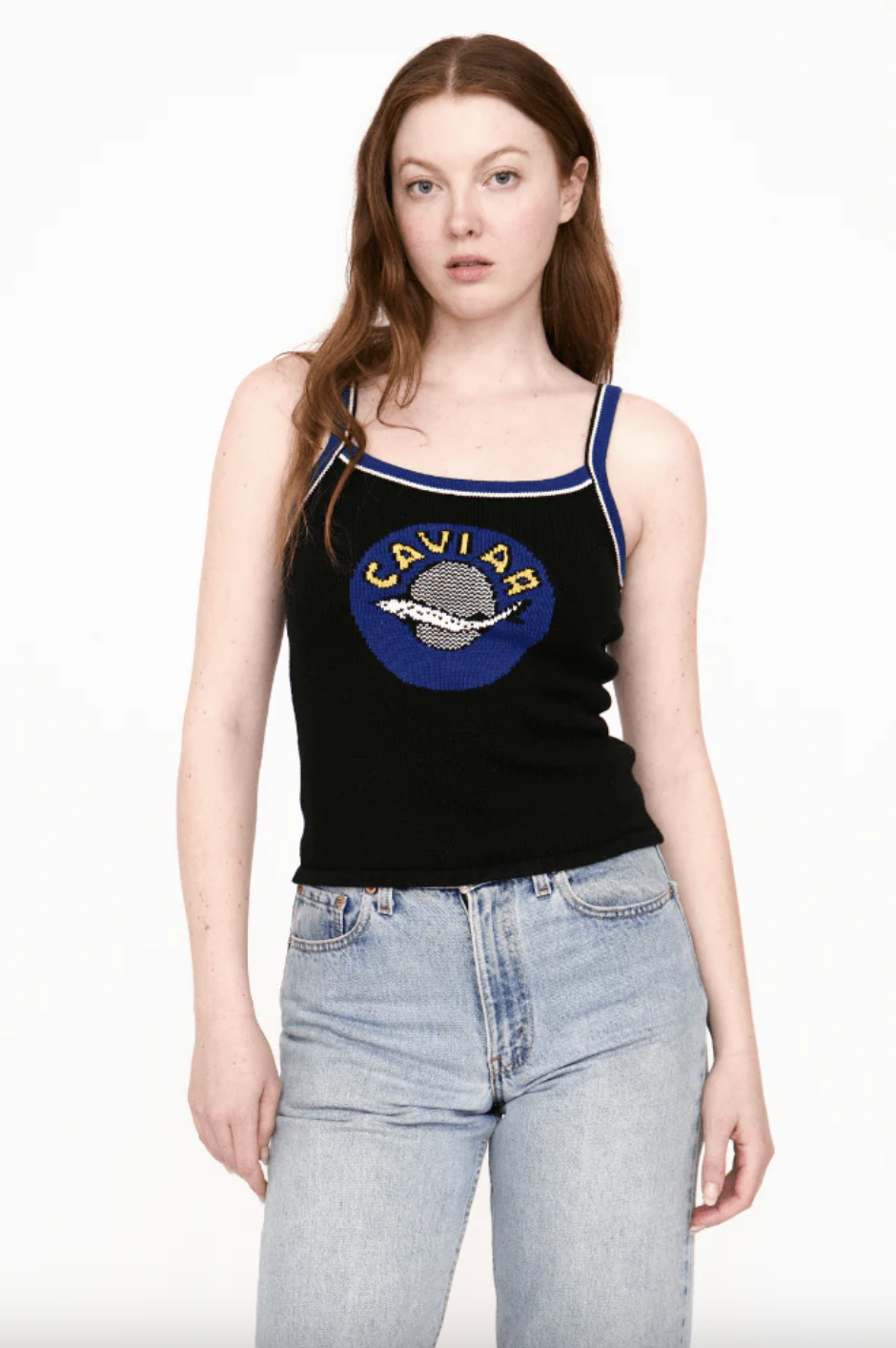 a model wears a Caviar Tank with jeans