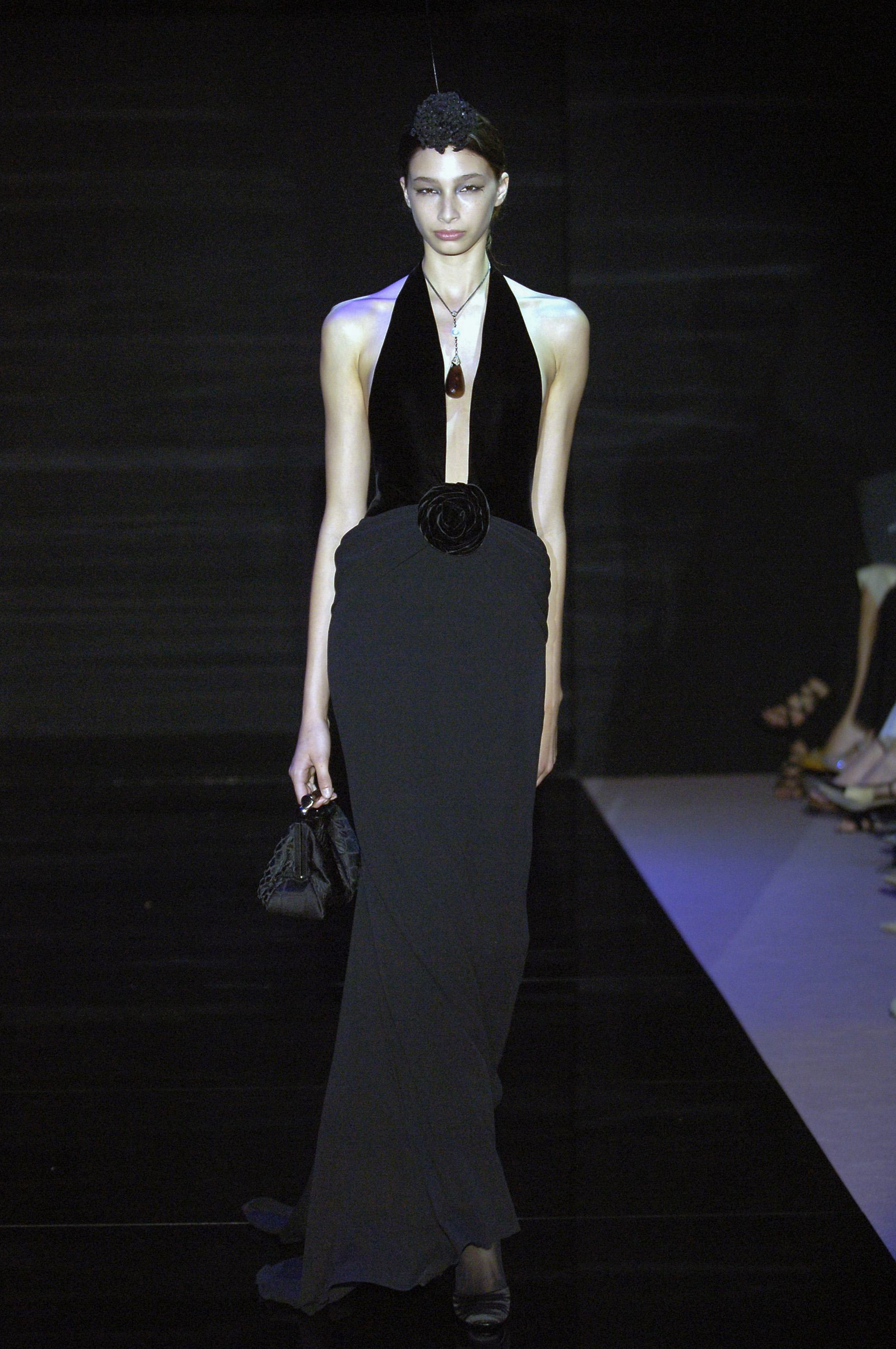 Australian model Alexandra Agoston walks the runway during the Armani Prive Haute Couture Fall Winter 2005-2006 fashion show as part of the Paris Haute Couture Fashion Week on July 6, 2005