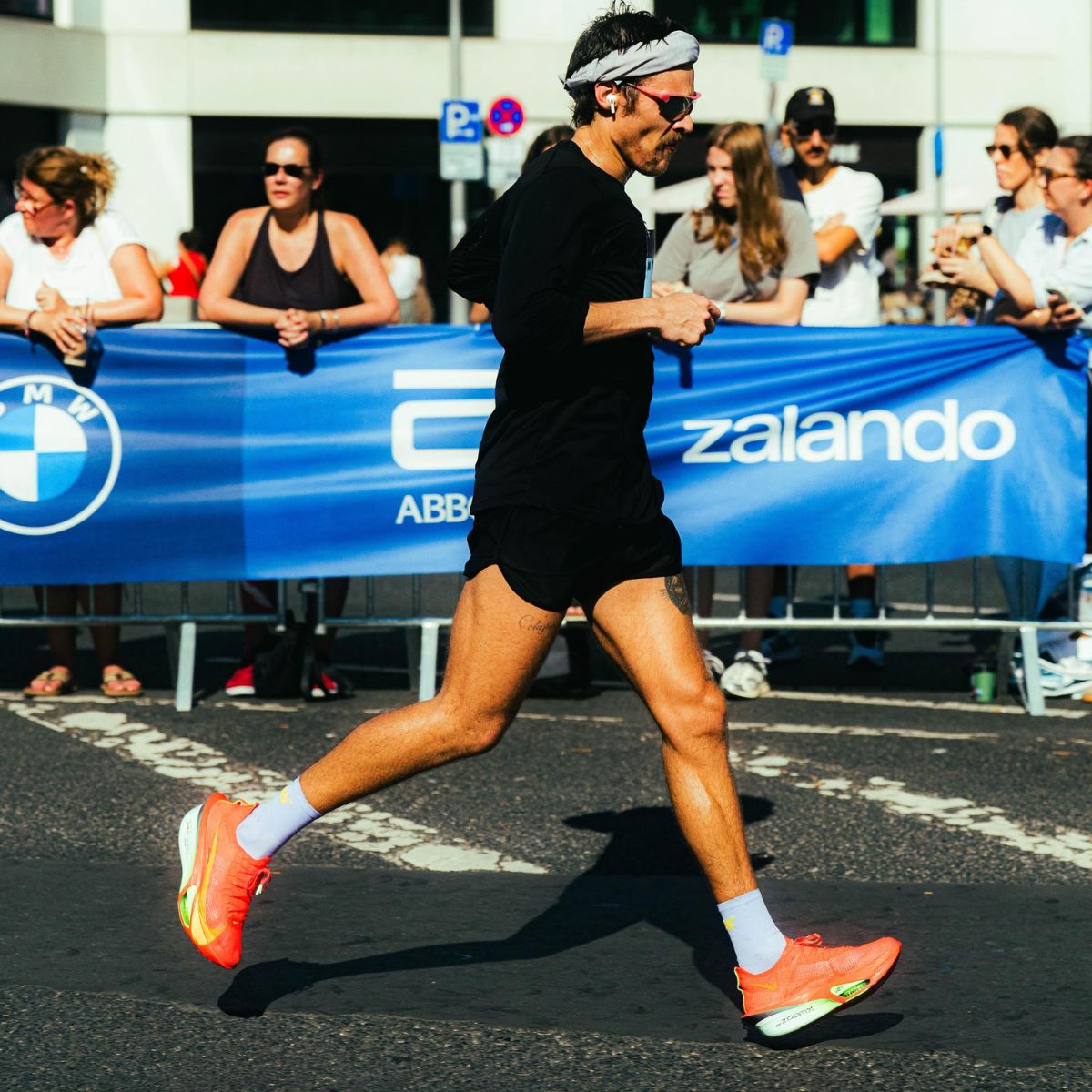 Harry Styles running Berlin Marathon wearing Nike, Sums, Tracksmith and District Vision
