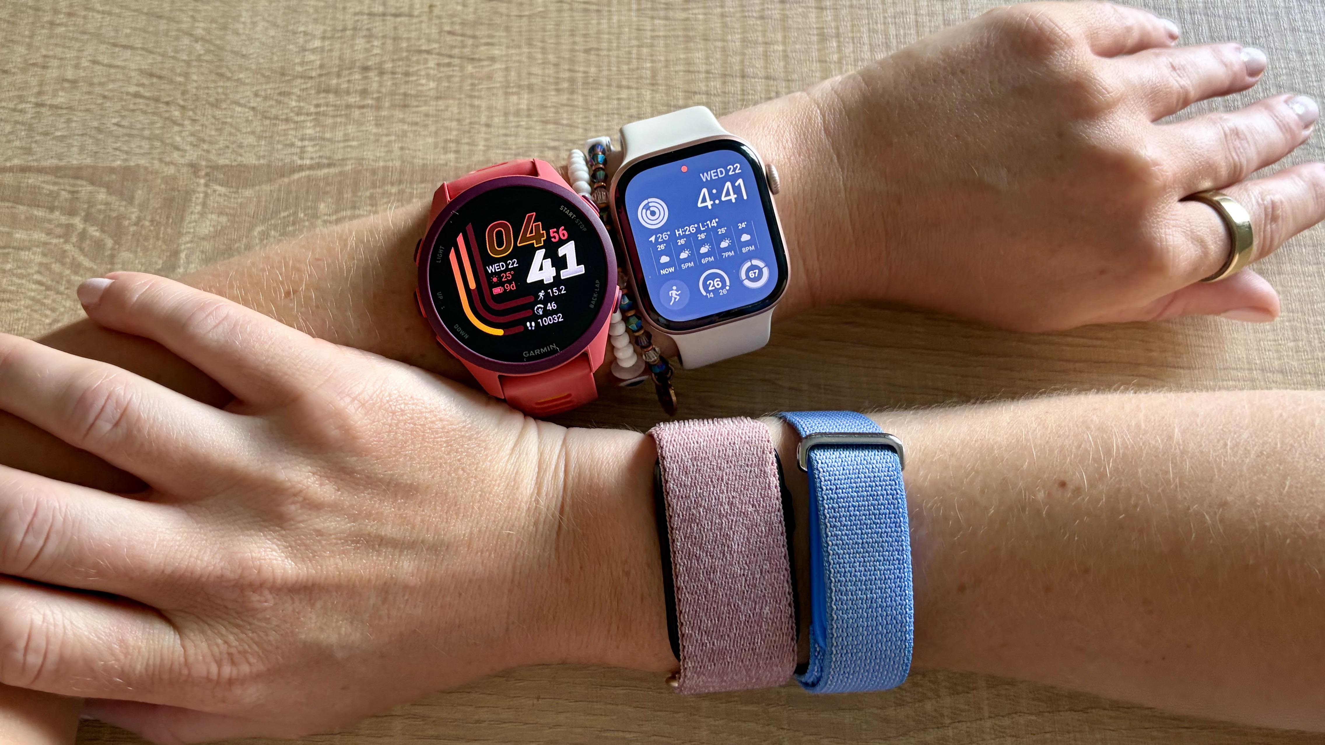 a photo of the fitbit air, garmin cirqa, oura ring 5, apple watch 11 and garmin forerunner 170