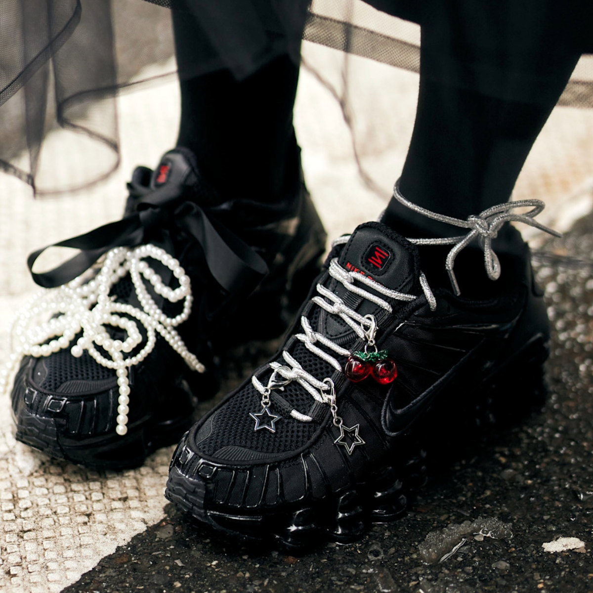 woman wearing black sneakers 