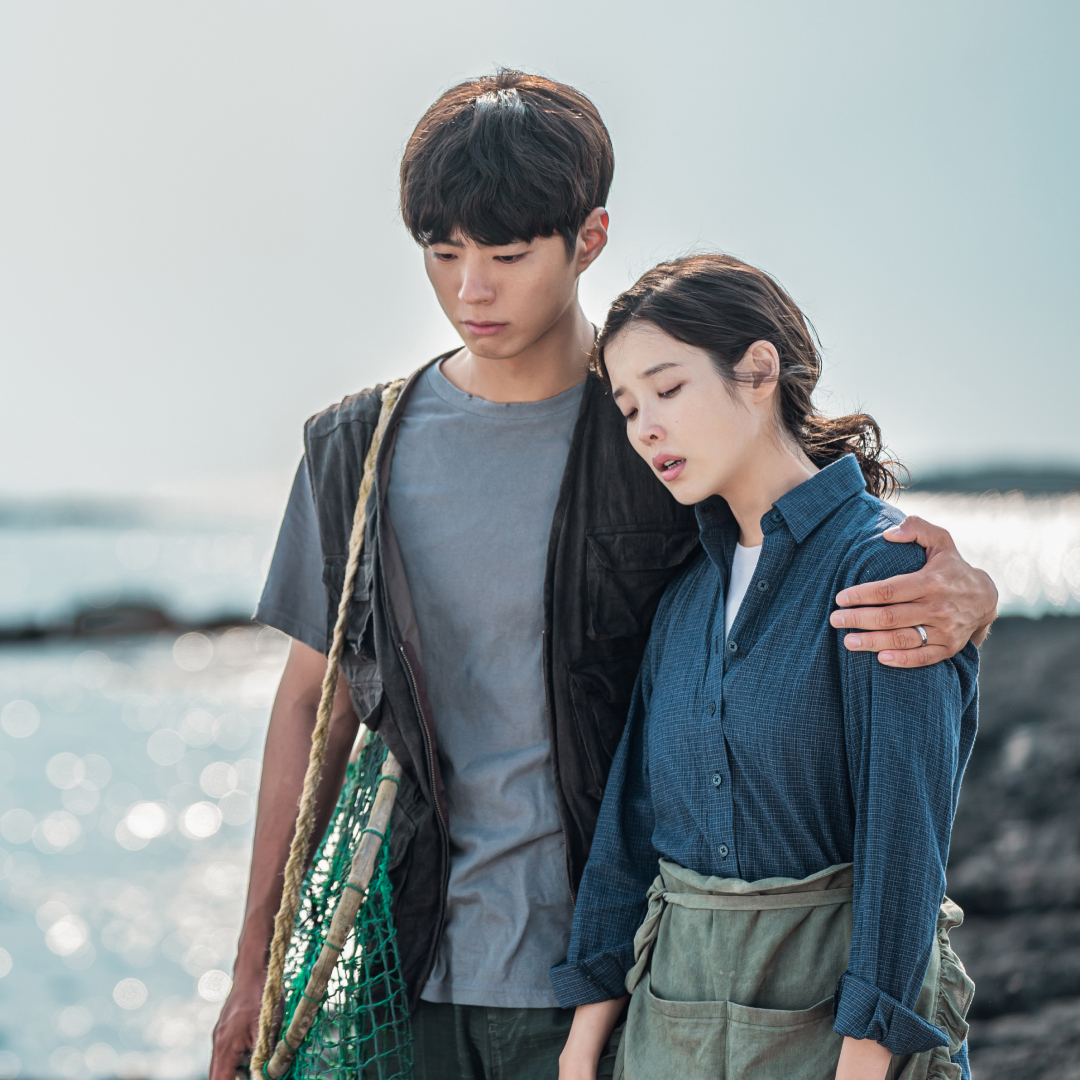 (L to R) Park Bo-gum as Yang Gwan-sik, IU as Oh Ae-sun in When Life Gives You Tangerines