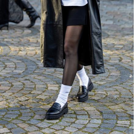 woman wearing loafers with socks