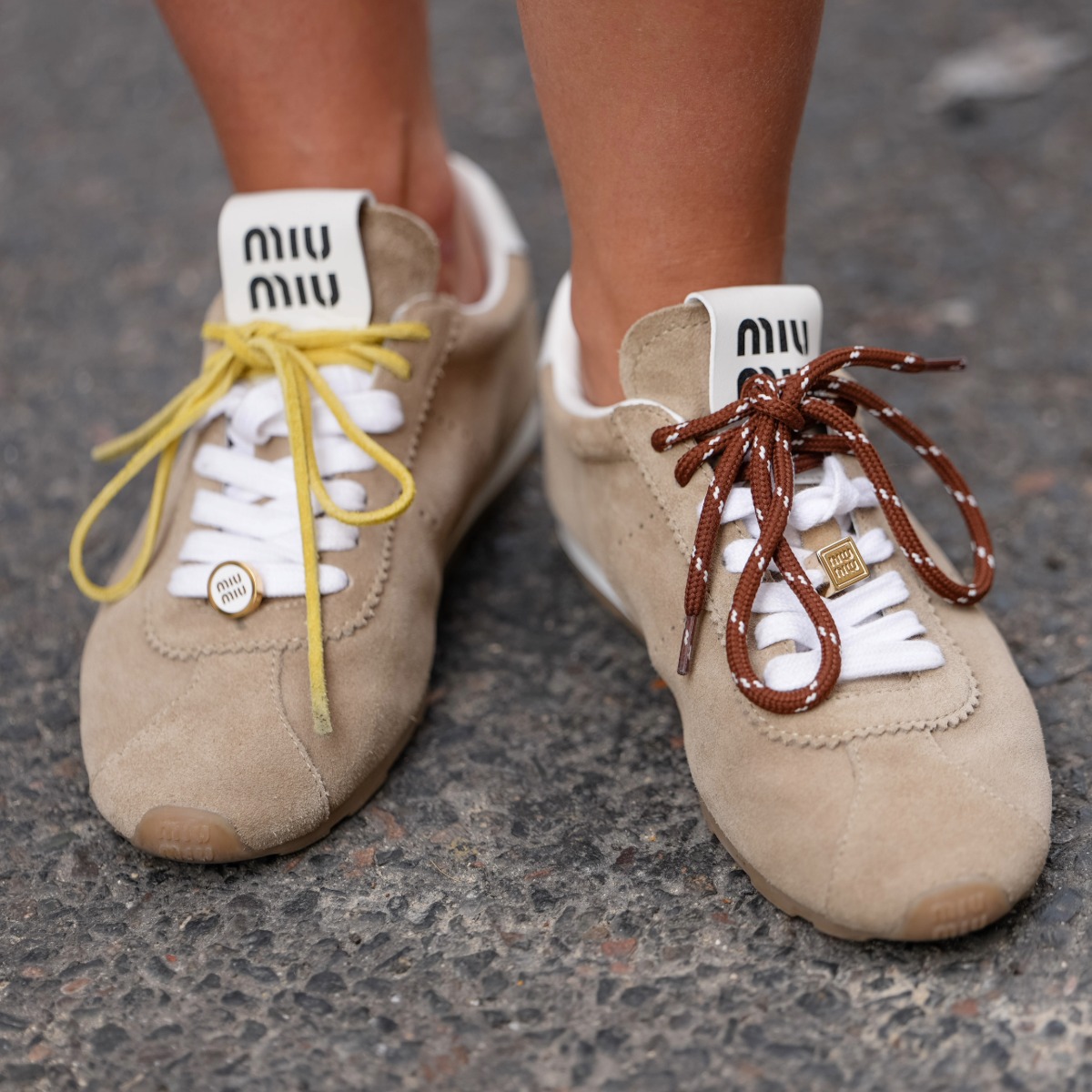 woman wearing suede sneakers 