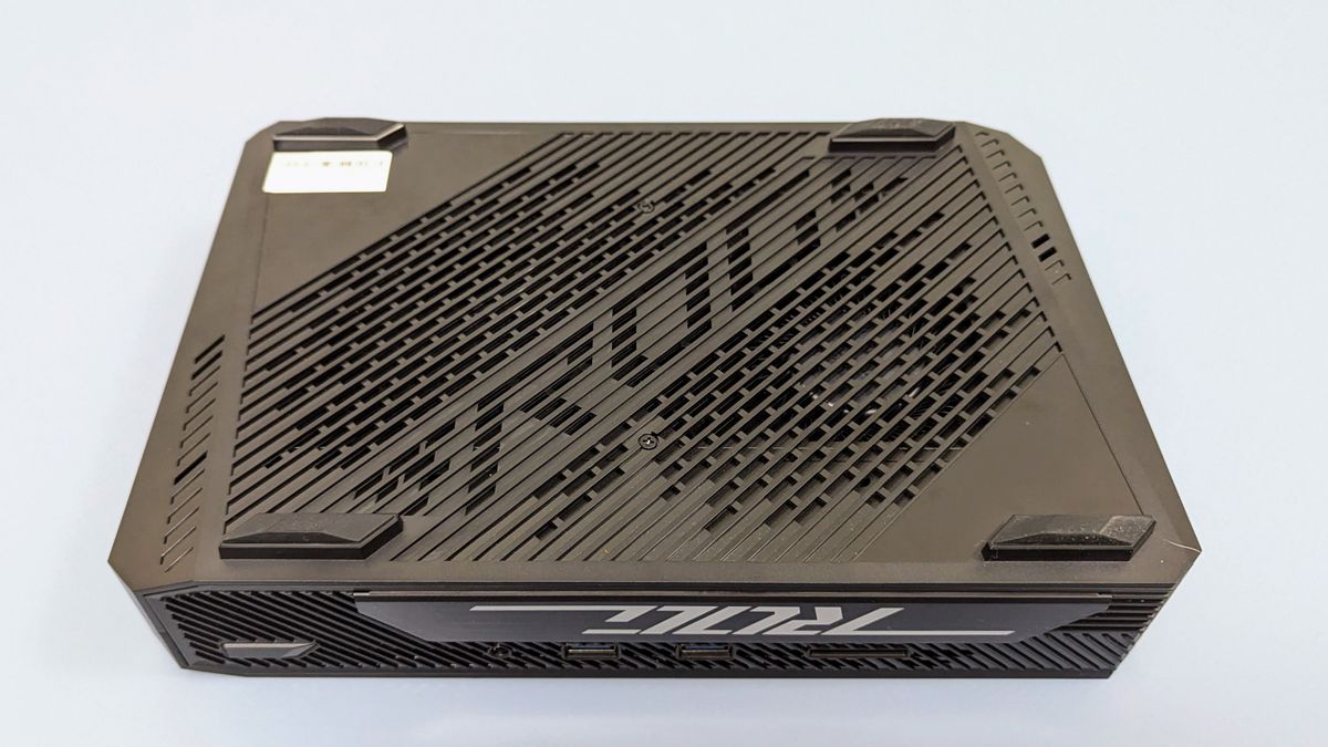 Asus ROG NUC 970 from the underside, showing fan inlets and rubber feet