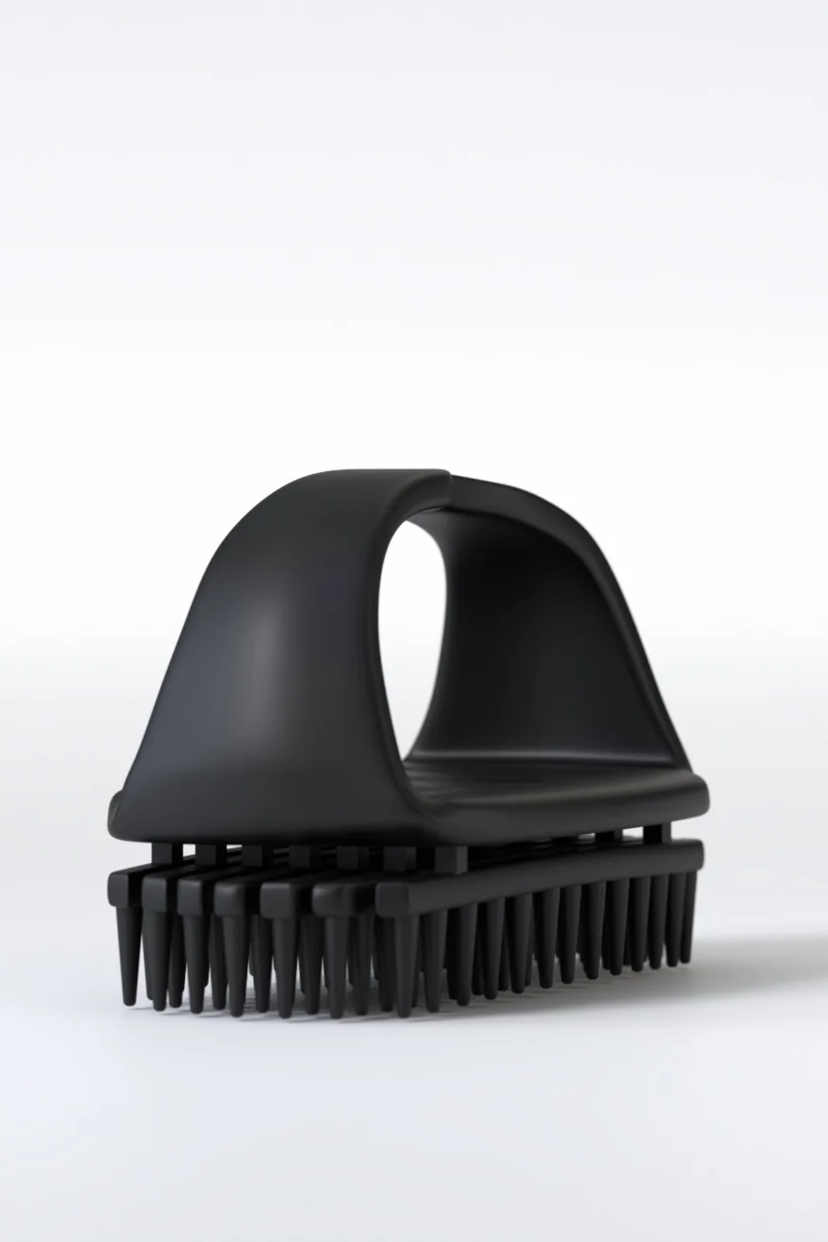 A black Naturally Drenched Scalp Flow Massager set against a white background.