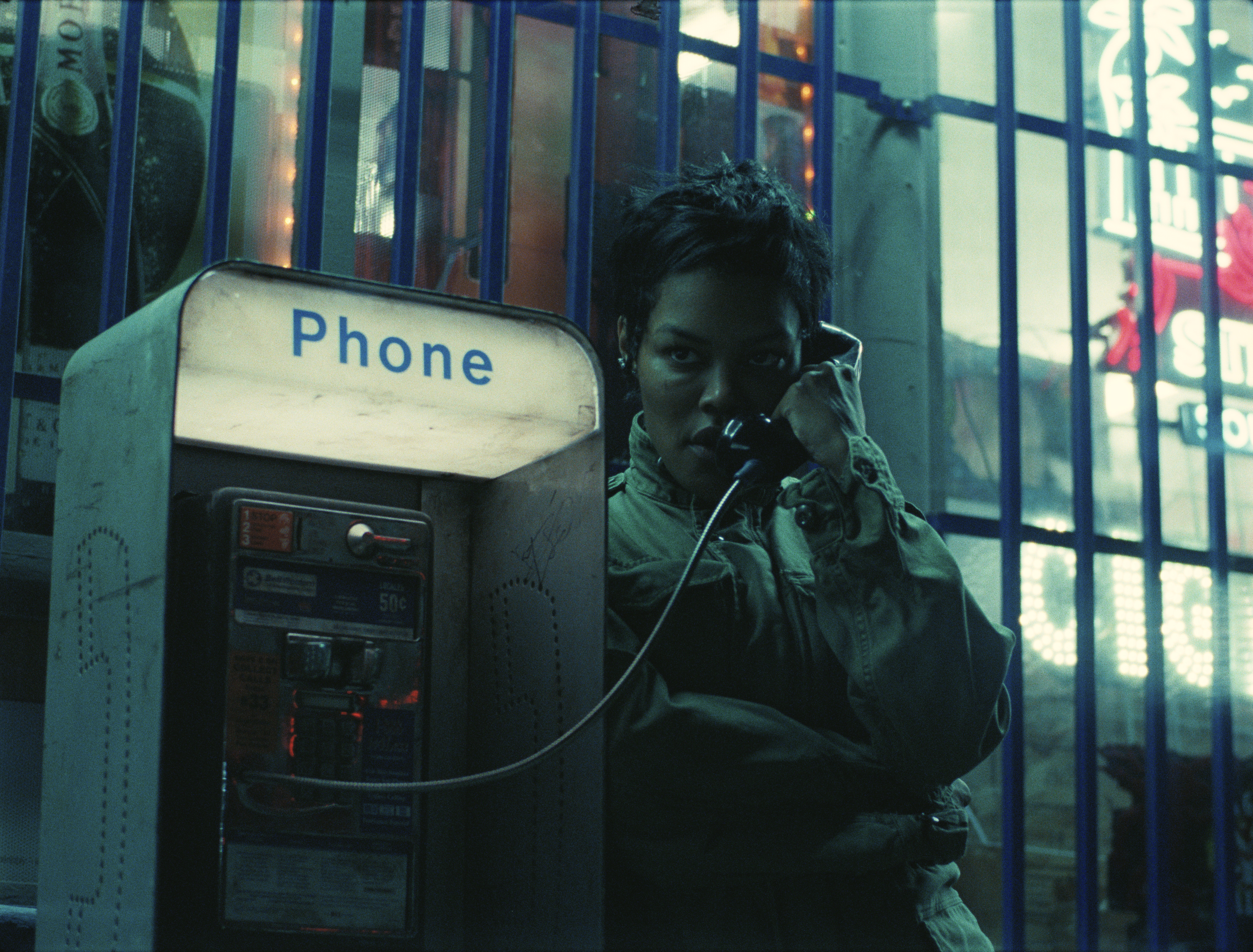teyana taylor as perfidia beverly hills talking on a payphone in one battle after another