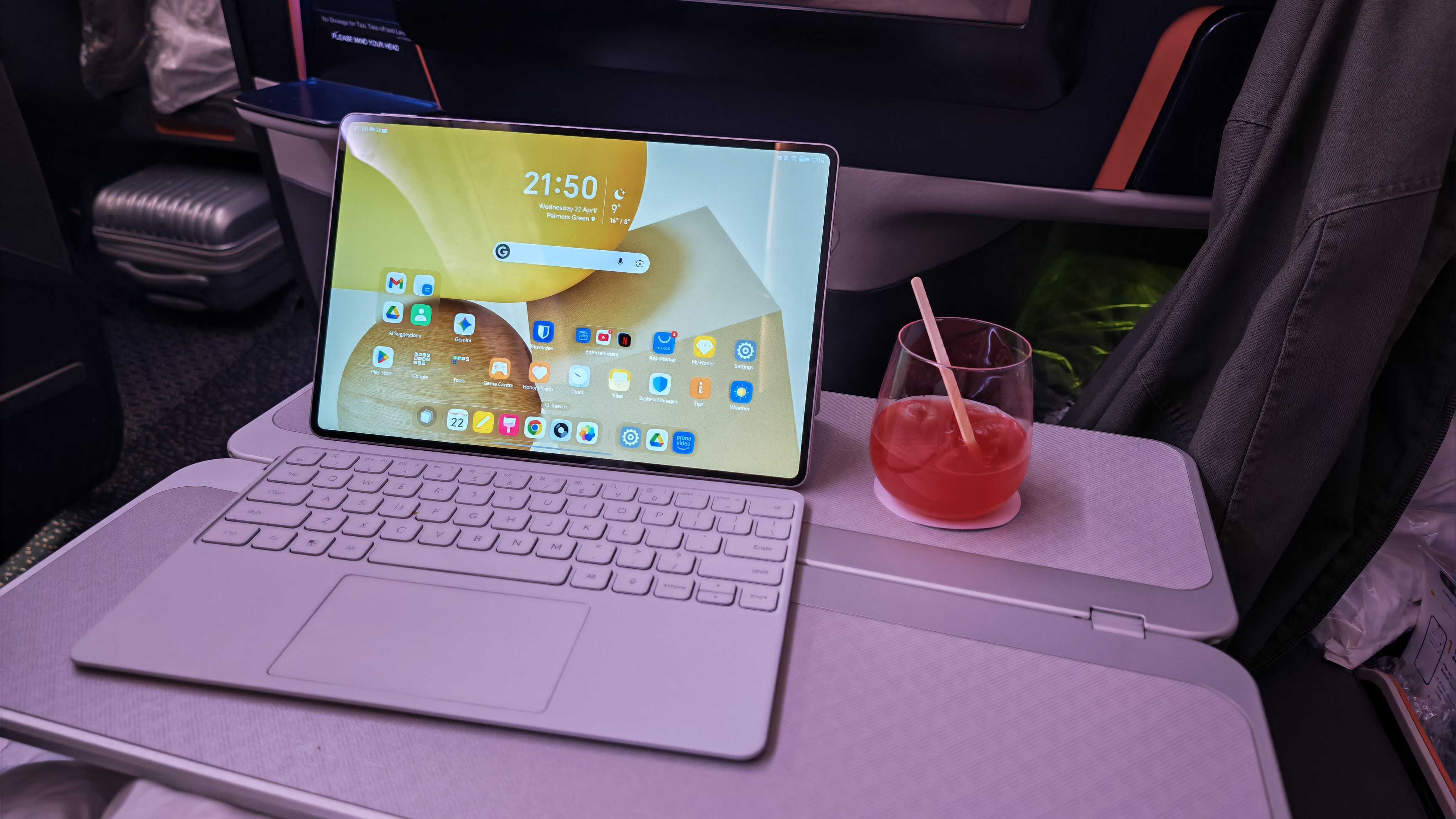 The Honor MagicPad 4 being used on a flight.