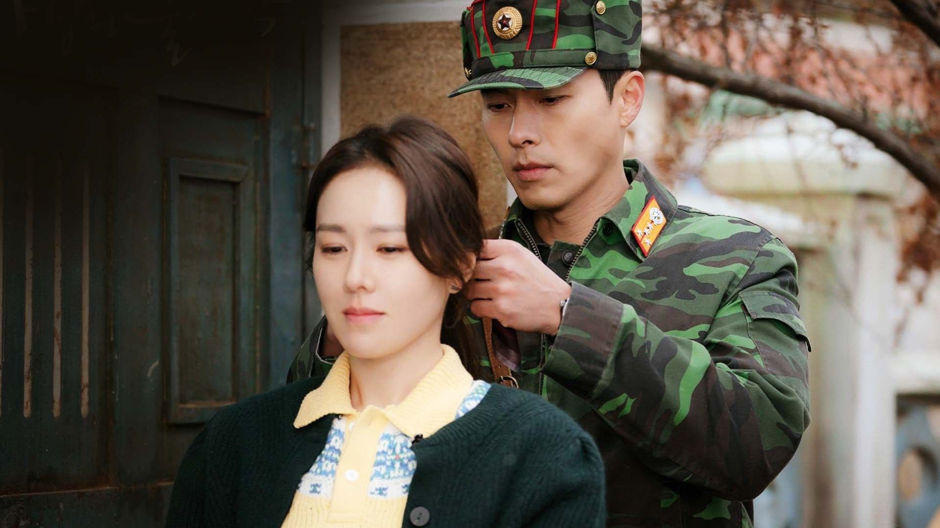 a North Korean soldier (Hyun Bin) ties up a woman&#039;s (Son Ye-jin) hair, in the Netflix k-drama &#039;Crash Landing on You&#039;