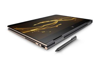 HP Spectre x360 laptop shown with digital stylus