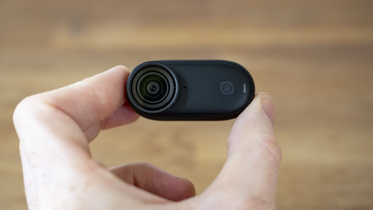 Tiny Insta360 Go 3S camera only in the hand