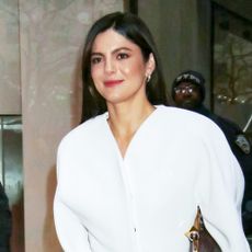 Monica Barbaro wearing a white outfit in NYC