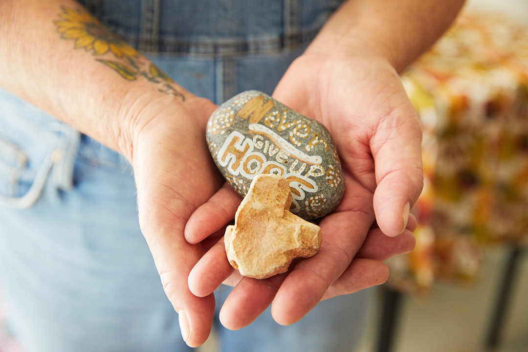 Jane holding rocks in her hand