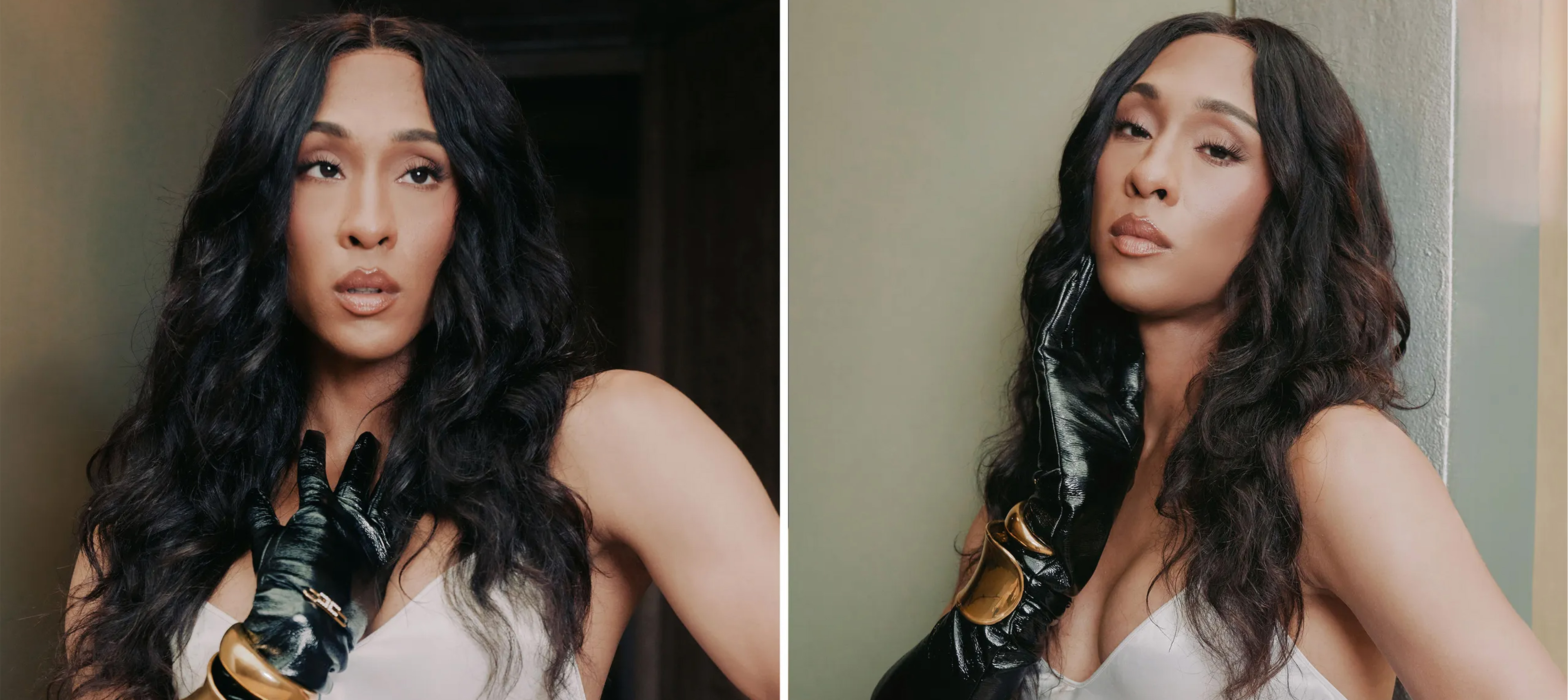 Michaela Jae Rodrigueze poses in a white dress with a black glove and gold bangles