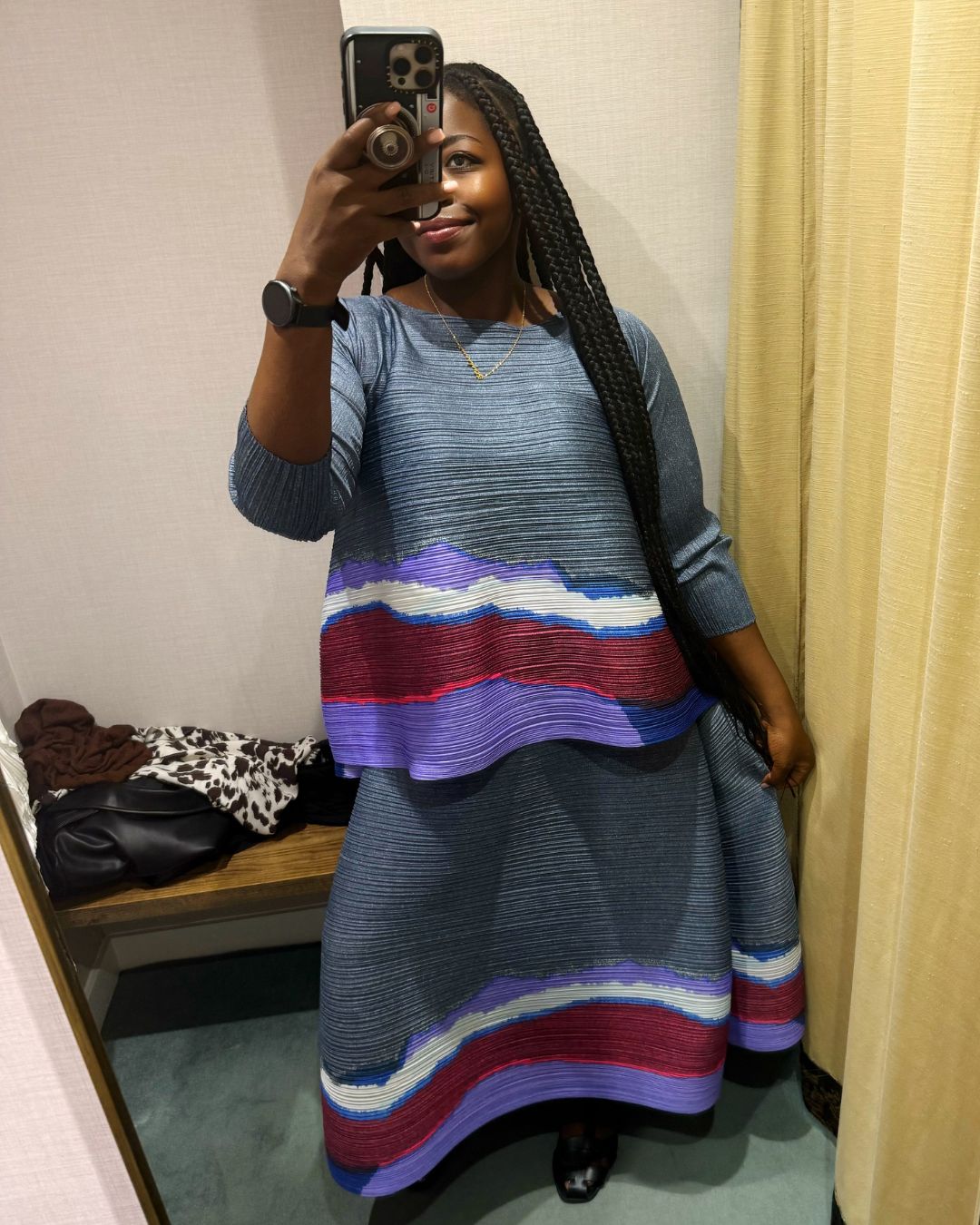 stephanie yeboah tries on a plus size pleats please issey miyake outfit