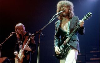 Tom Scholz (left) and Brad Delp perform onstage with Boston in 1978 in Los Angeles, California