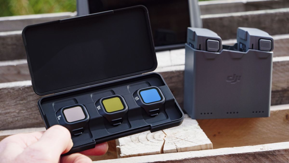 DJI Mini 5 Pro's ND filter set, with battery charging hub in the background