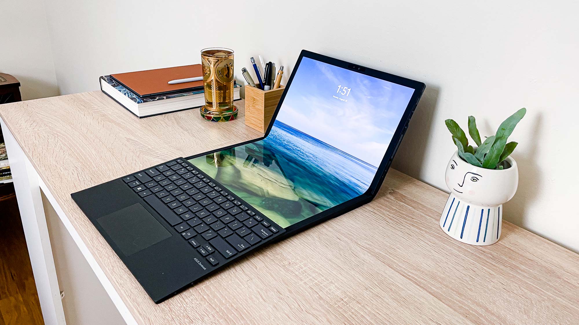 Asus Zenbook 17 Fold OLED review unit on desk with keyboard out in front