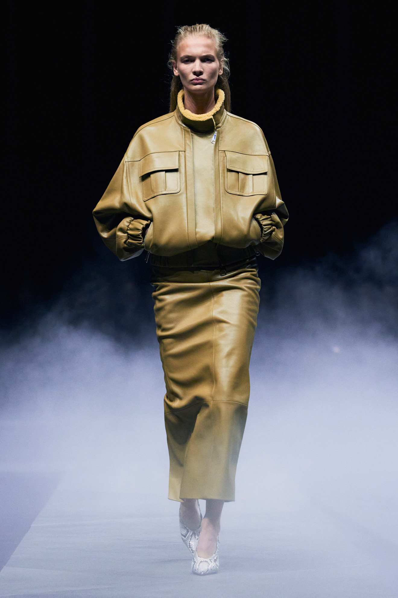 tan leather funnel neck jacket at Khaite Spring 2026