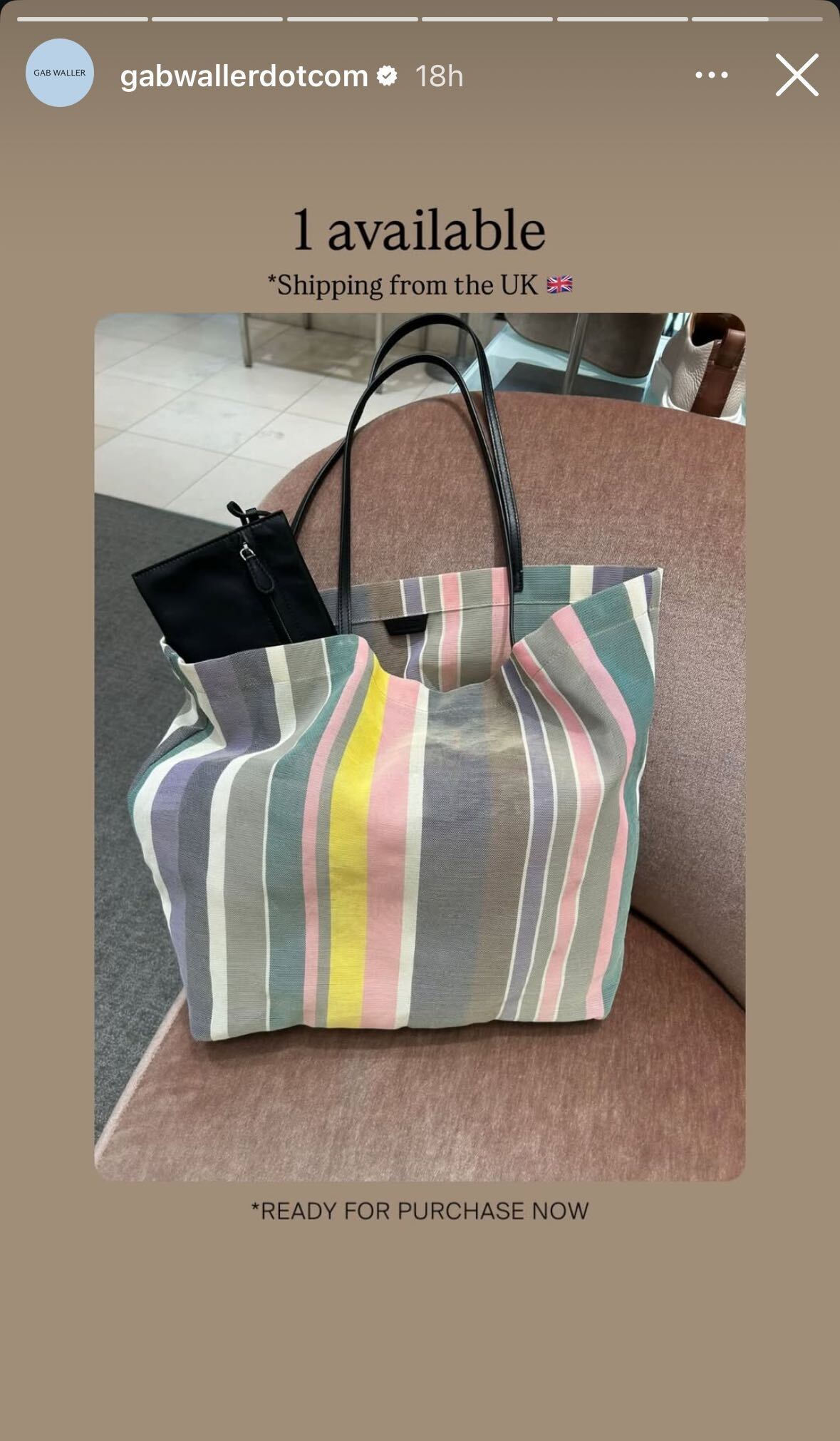 a photo of The Row's mesh Barn Tote sitting on a chair