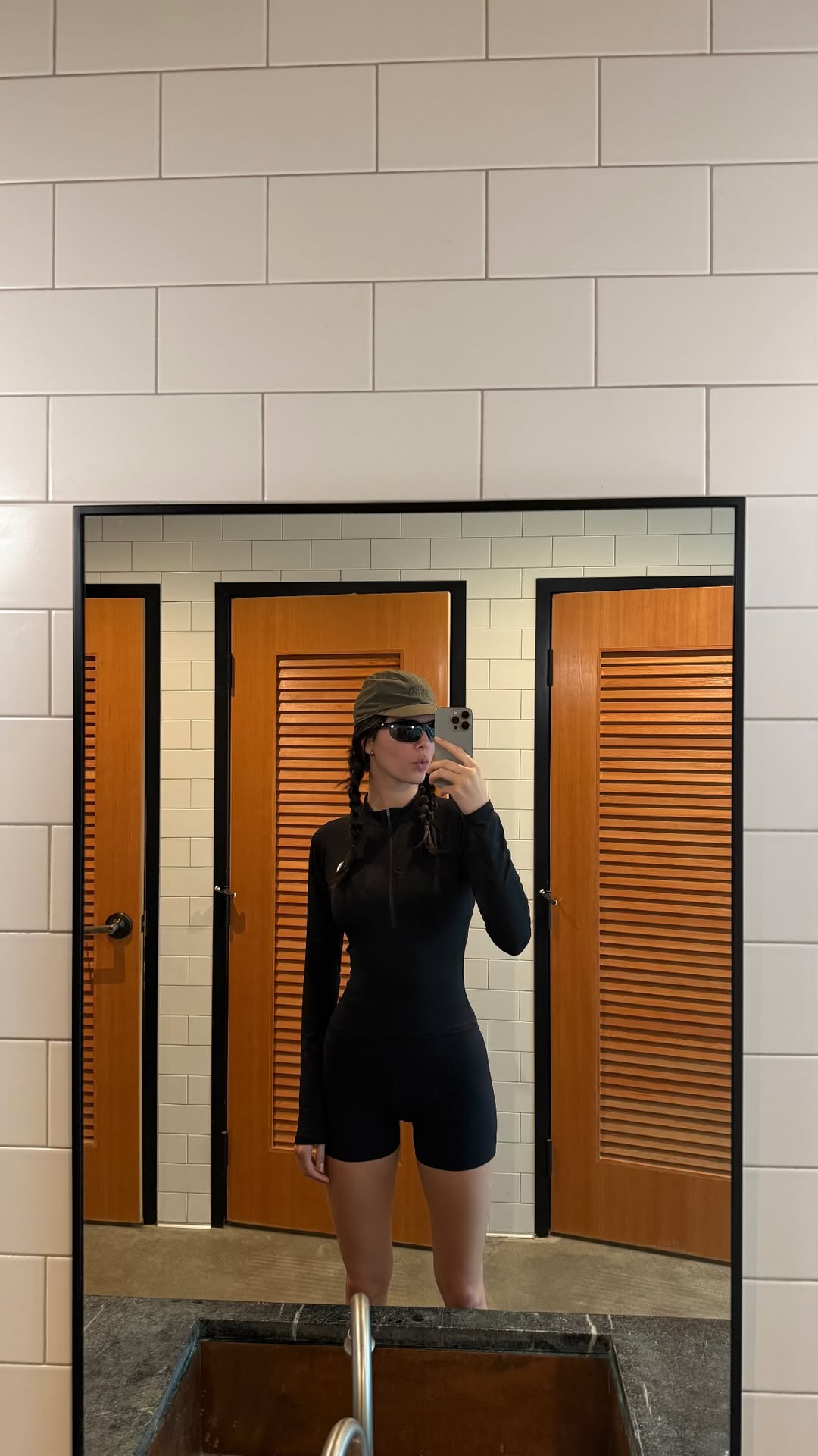 Kendall Jenner wears Salomon sneakers on a hike