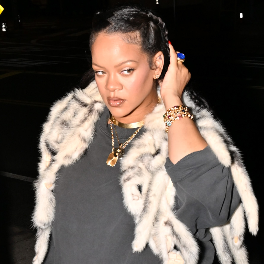 Rihanna signaled the early start of fall fashion with a fur shawl in LA