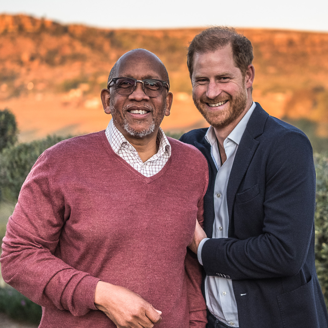 Prince Harry and Princes Seeiso posing in front of a mountain in Lesotho