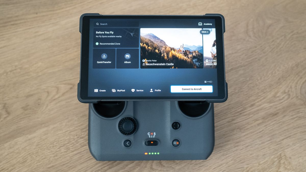 DJI RC 2 smart controller on a wooden floor