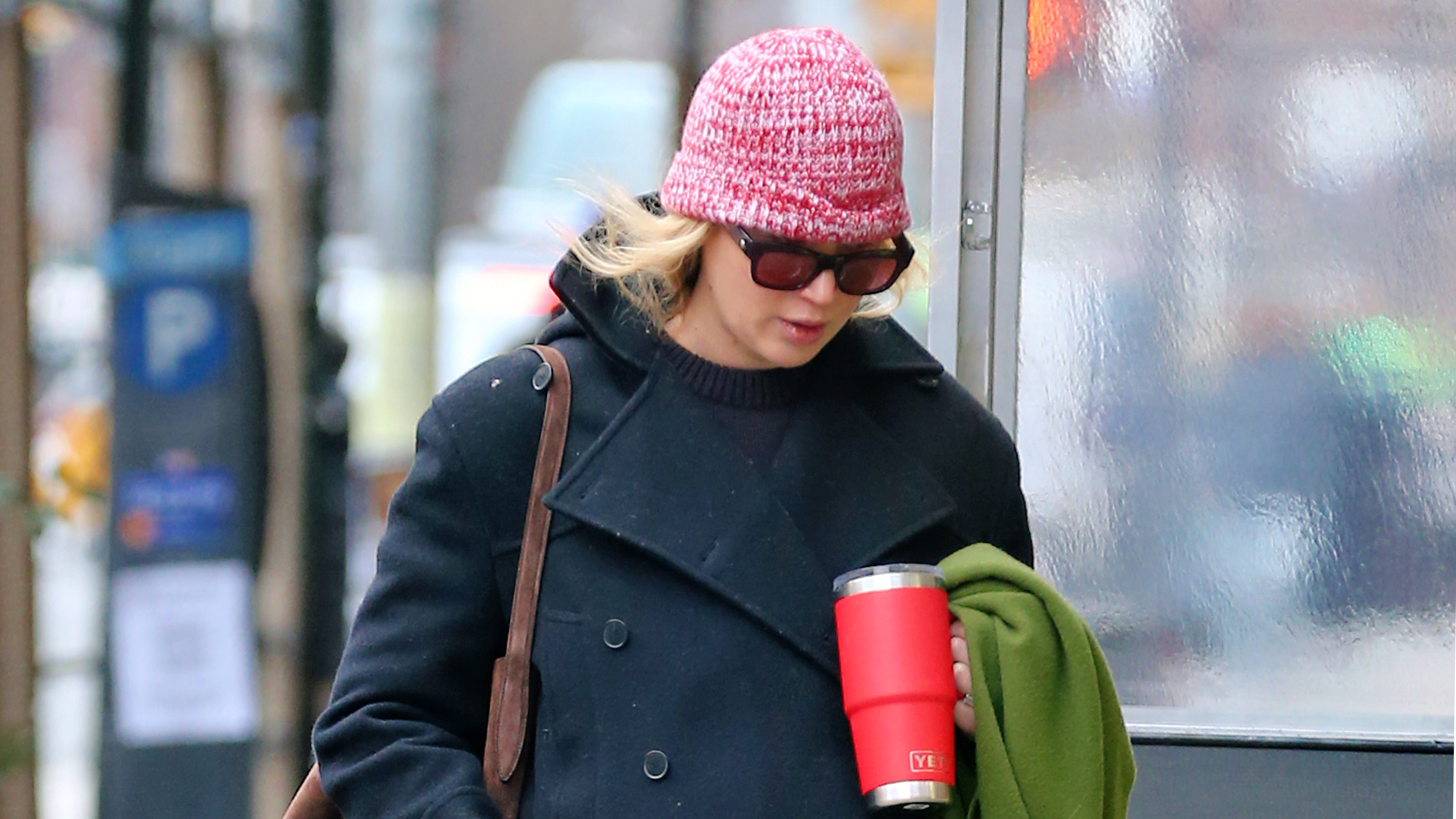 Jennifer Lawrence walks in Manhattan wearing a Liffner bag