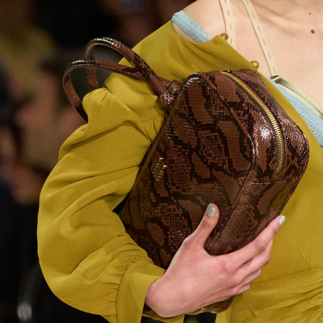 a brown snakeskin bag at Miu Miu Fall 2025 fashion show