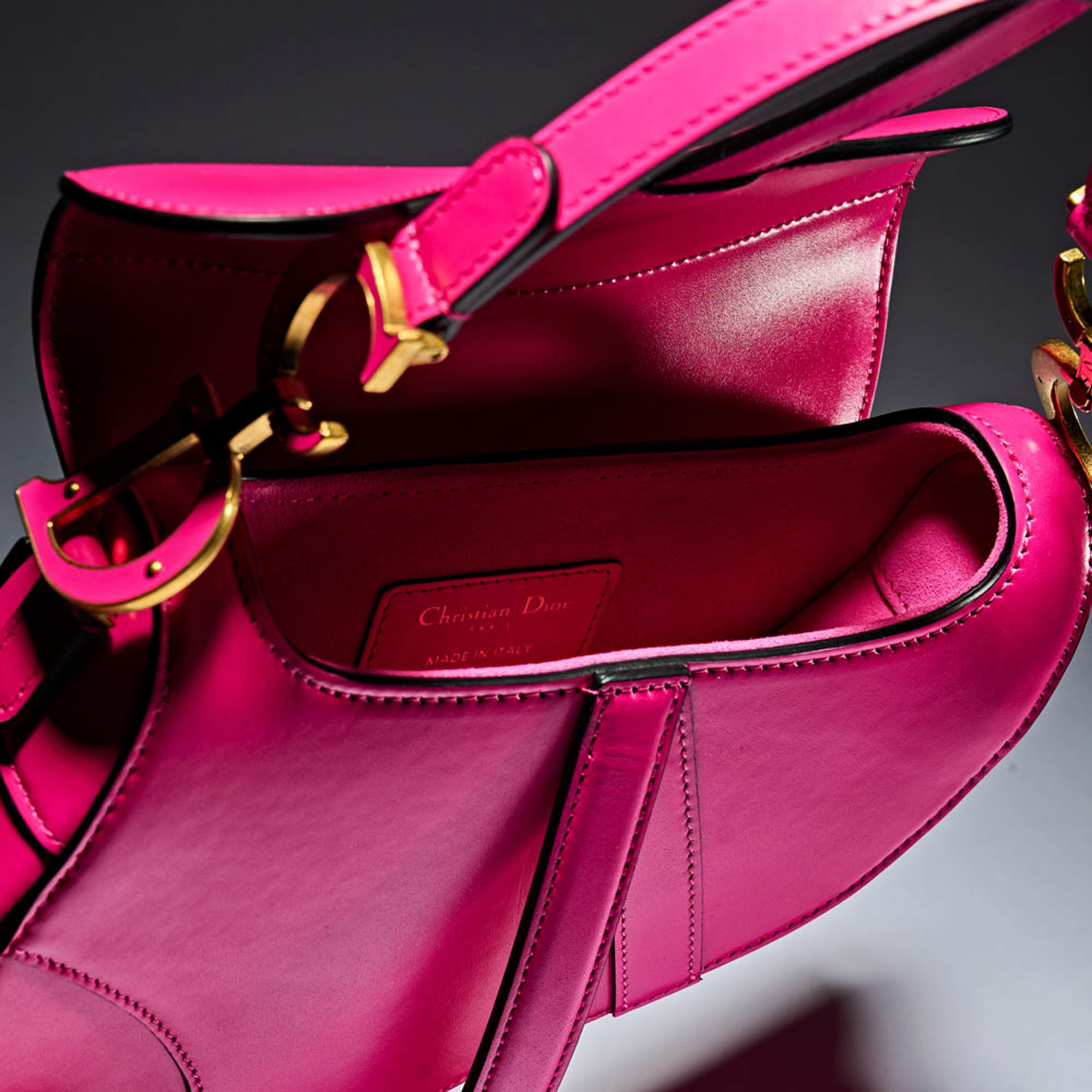 An image of the hot pink fuschia Dior Saddle bag, part of marie claires The One franchise