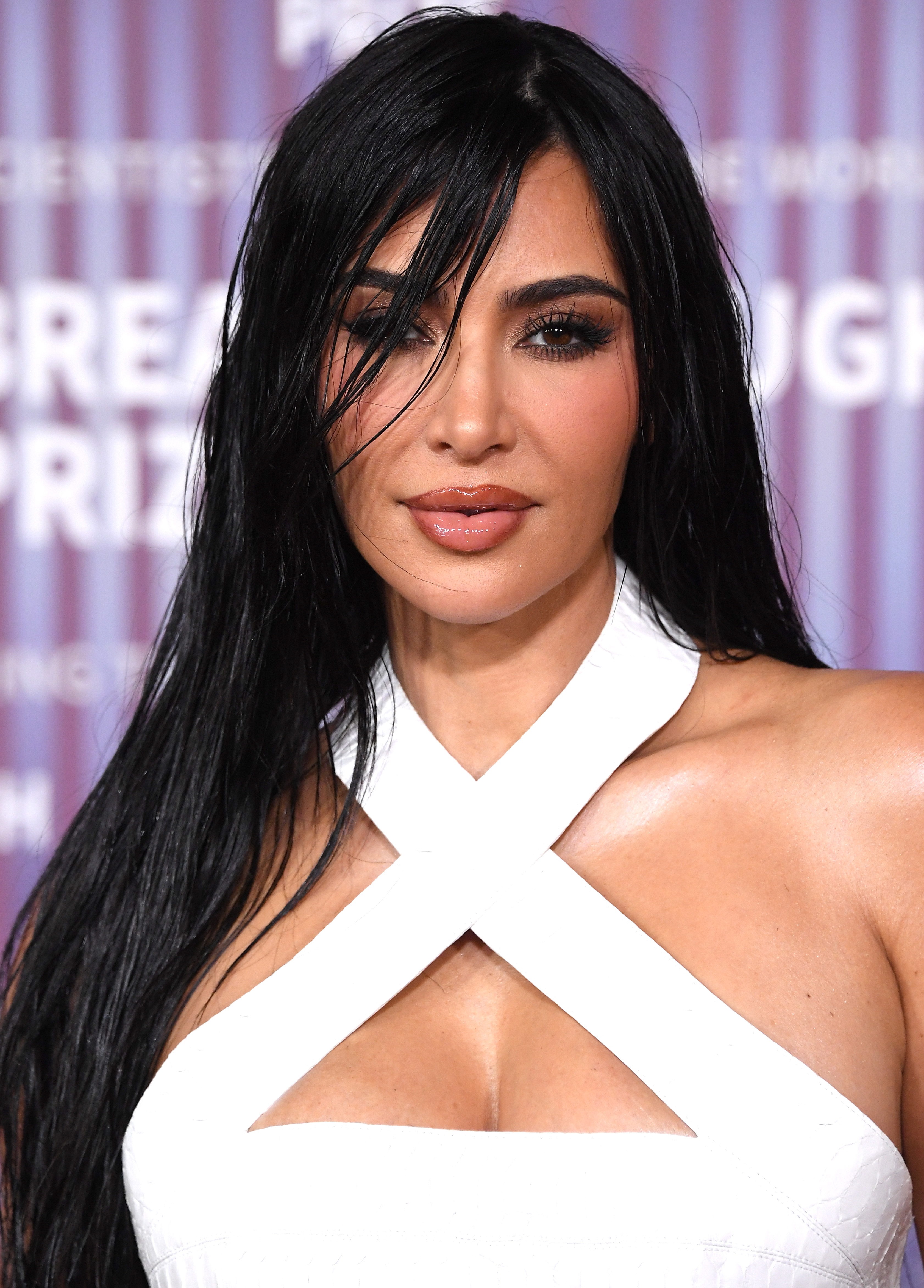Kim Kardashian with a wet layered hair look