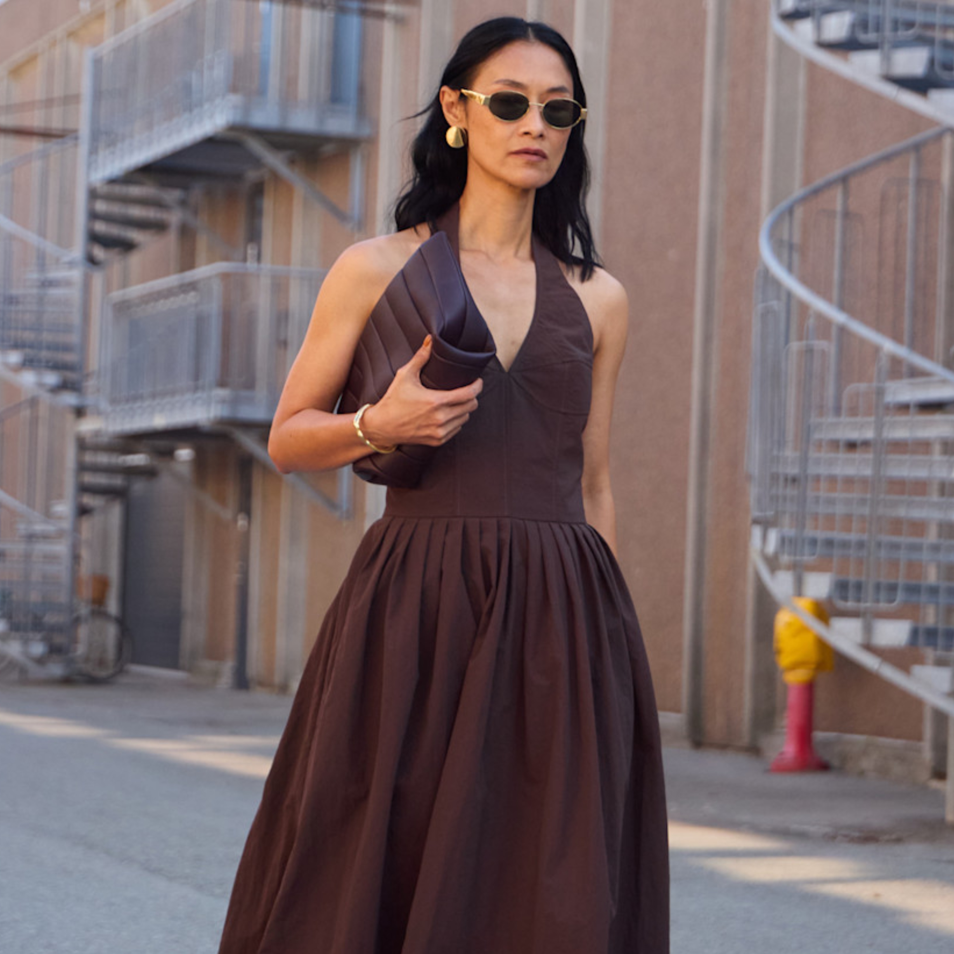 woman wearing a brown dress