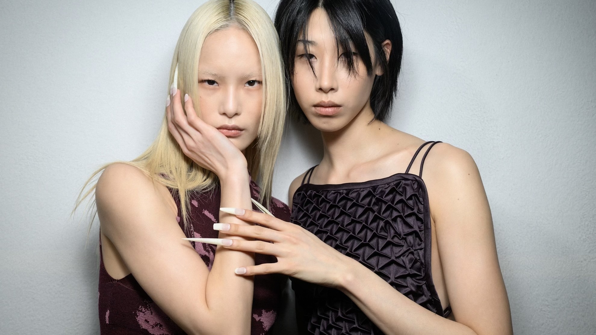 Bst body oils, two models wearing brown tops