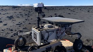 rover with an iceland mountain in background