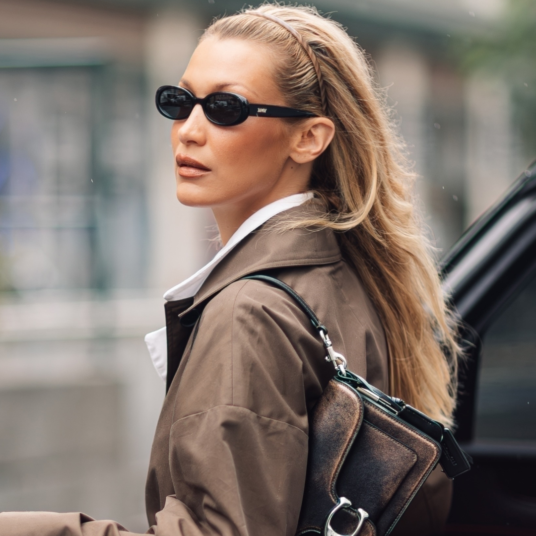 Bella Hadid was spotted in Paris wearing a brown Coach tabby bag
