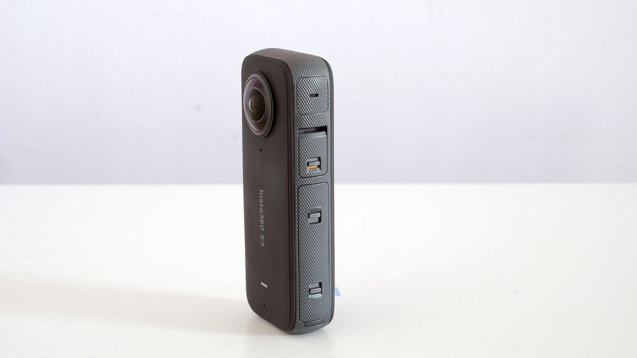 Insta360 X3 side view on white background