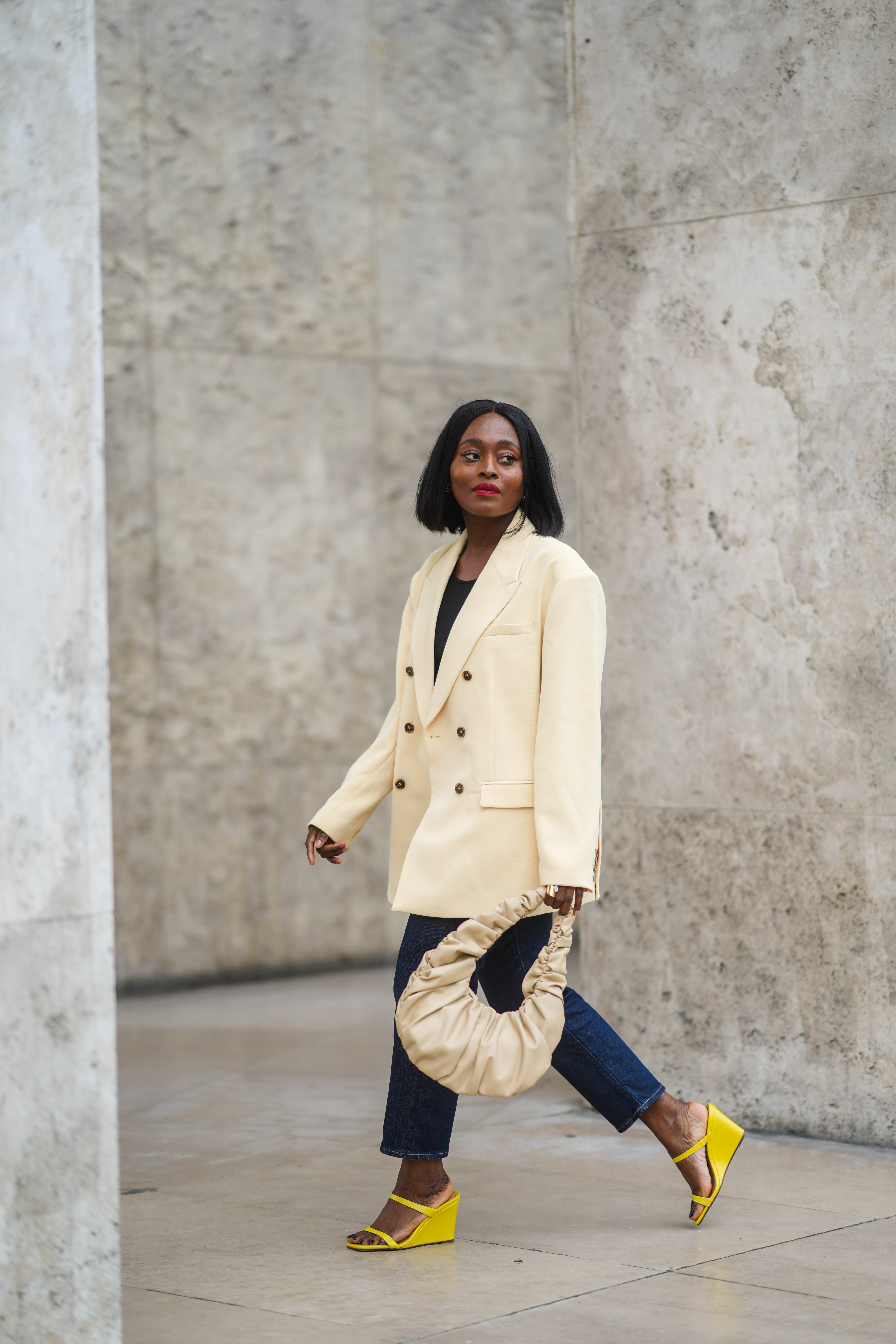 woman wearing leather wedge sandals