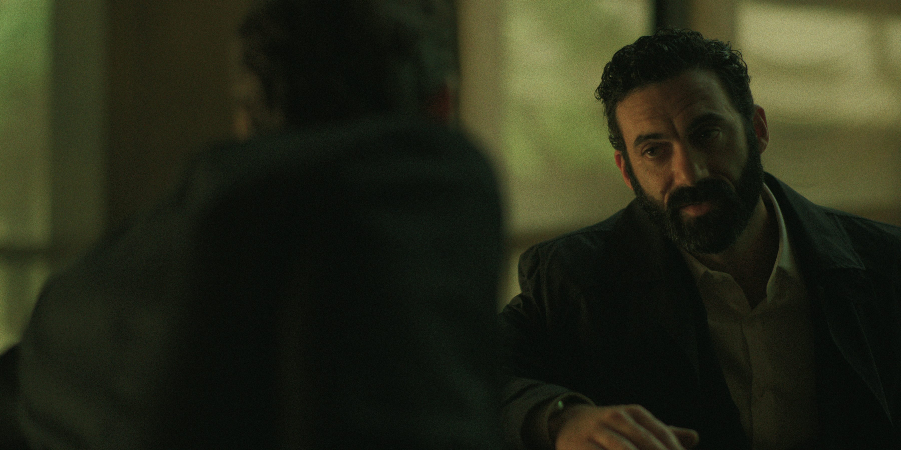 morgan spector as campbell having a tense conversation in black rabbit