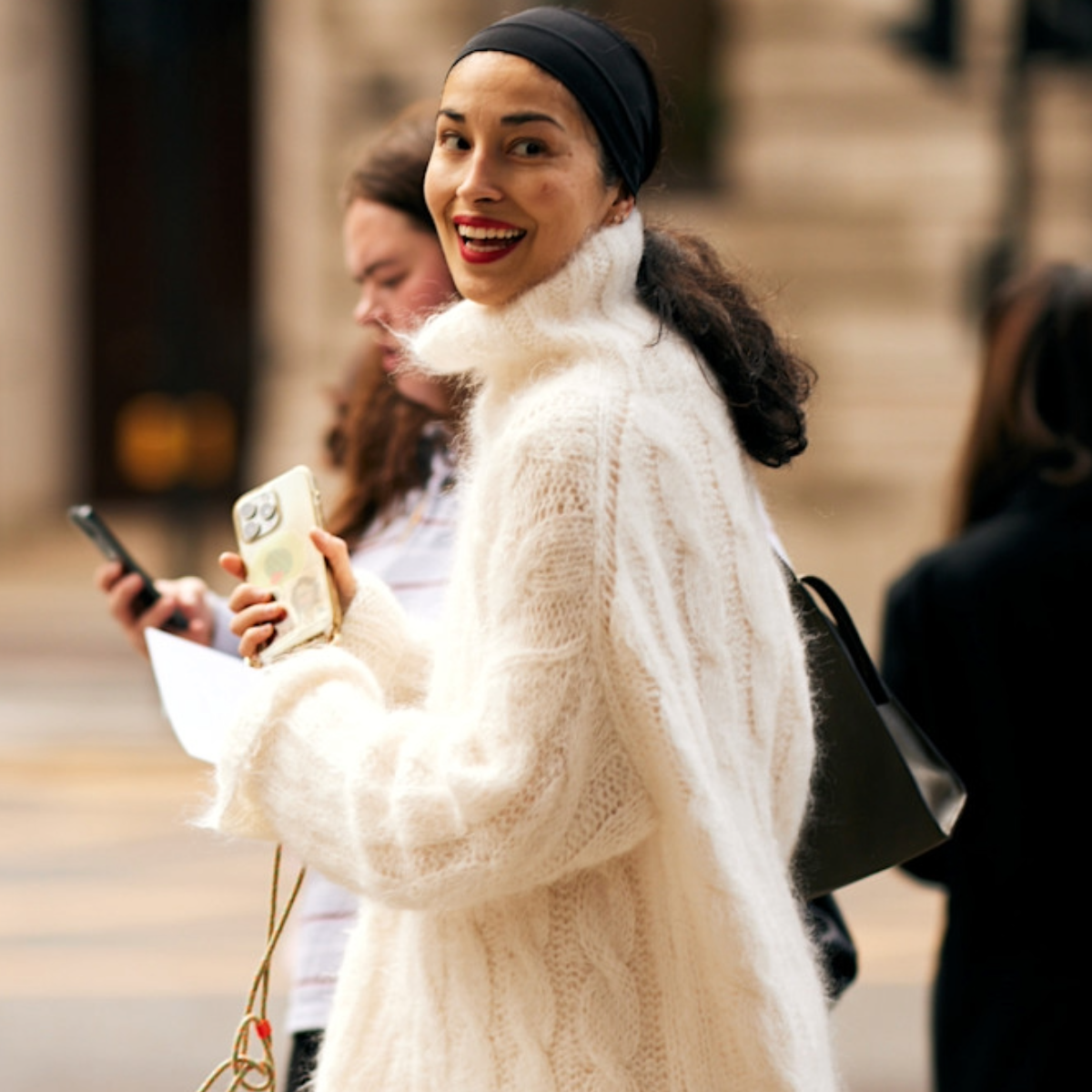 woman wearing a white sweater